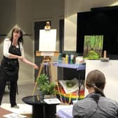 Jan Taylor, the driving force behind nJoyArt, teaching a previous group.