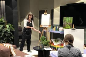 Jan Taylor, the driving force behind nJoyArt, teaching a previous group.