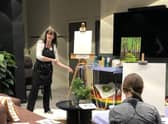 Jan Taylor, the driving force behind nJoyArt, teaching a previous group.
