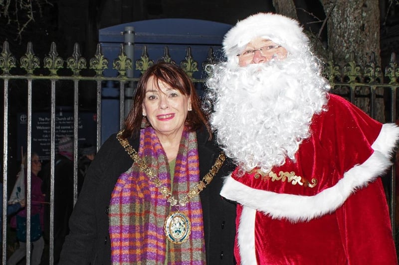 Rugby Mayor Maggie O'Rourke with Santa Claus.