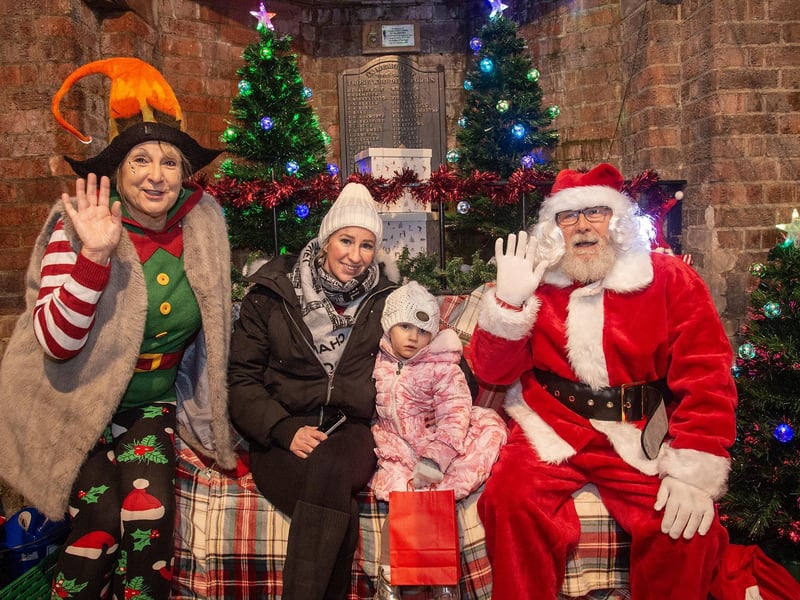 Grotto meet and greet - Maxine Appleton Dolcie aged four with Santa and his elf.