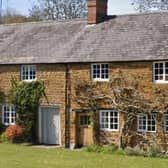 A plan to extend a Grade II listed cottage in Warmington to bring it up to modern day standards has been approved in spite of objections from the district council's planning officer.