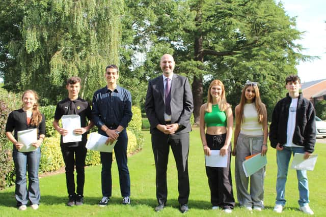 GCSE pupils with Headmaster, Grove du Toit at Princethorpe College this morning. Left to right: Jemima Teeton, Giorgio Kleinmann, Lampros Papadogiannakis, Grove du Toit (Headmaster), Megan Shipton, Mia Samra and Alexander MacRae. Photo by Princethorpe College