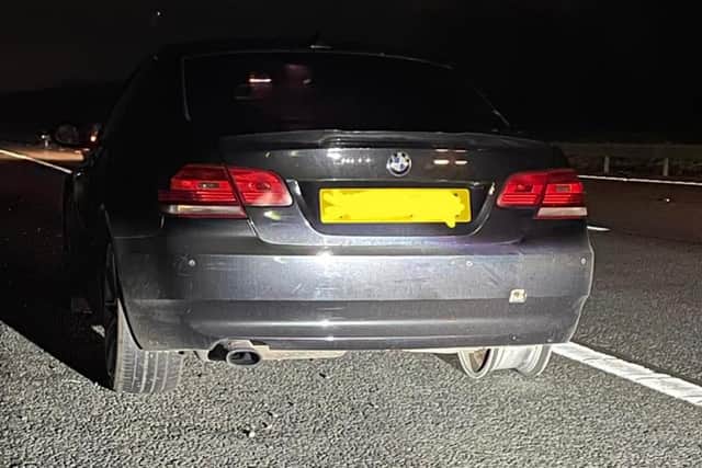 A motorist has been arrested after driving for about 50 miles with a missing tyre.