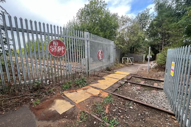 The path that runs from the western end of Edward Street to Newbold crosses the currently disused railway line and runs close to the quarry - it would be diverted before trains return.