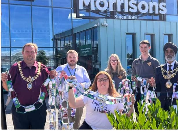 Photo shows: Mayor of Leamington Cllr Nick Wilkins, people manager Dan Spiers, people clerk Hannah Wainwright, customer assistant Will Potts, community champion Alex Pearson and the Mayor of Warwick Cllr Parminder Singh Birdi