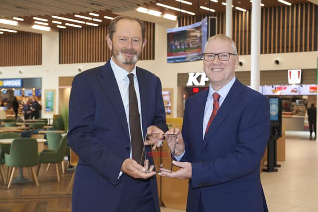 Award being presented by Transport Focus chief executive Anthony Smith (left) to Moto chief executive Ken McMeikan. Photo supplied