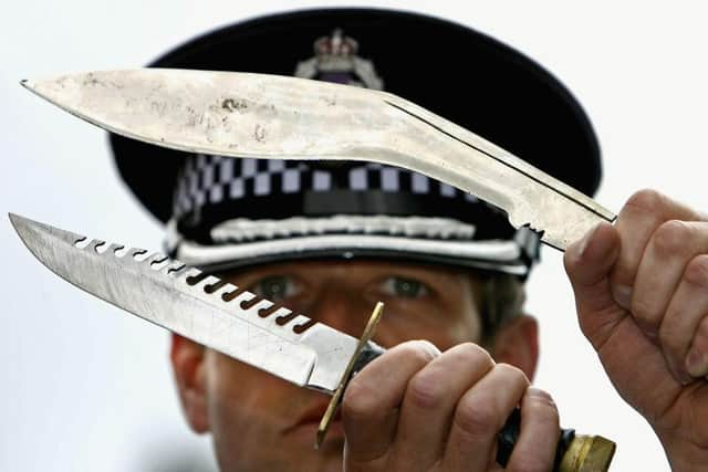 Knives recovered in an amnesty.  (Photo by Jeff J Mitchell/Getty Images)