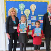 Rotary President Keith Talbot and Brenda Talbot with Coten End Primary school pupils. Photo supplied