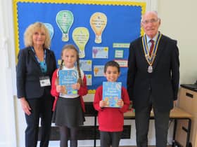 Rotary President Keith Talbot and Brenda Talbot with Coten End Primary school pupils. Photo supplied