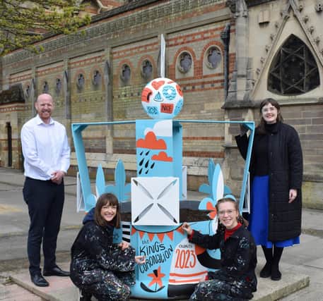 Tom Kittendorf, Rugby Borough Council chief officer for leisure and wellbeing, Pickle Illustration's Lauren and Liv, and Phoebe Hilton, Rugby Art Gallery and Museum's senior learning and engagement officer, at the new piece of public art now on display in the town centre.