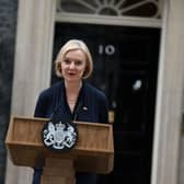 Britain's Prime Minister Liz Truss delivers a speech outside of 10 Downing Street in central London on October 20, 2022 to announce her resignation. - British Prime Minister Liz Truss announced her resignation on after just six weeks in office that looked like a descent into hell, triggering a new internal election within the Conservative Party. (Photo by Daniel LEAL / AFP) (Photo by DANIEL LEAL/AFP via Getty Images)
