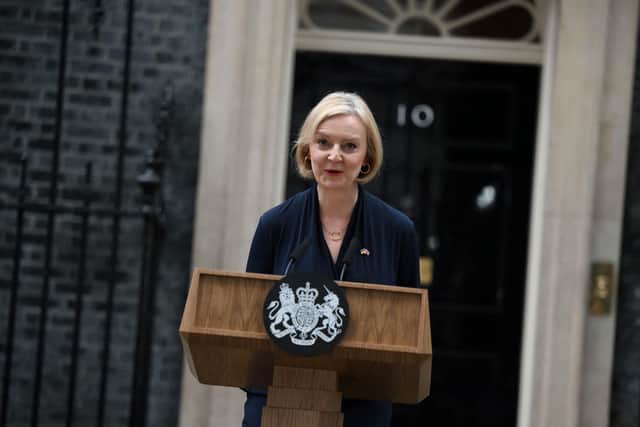 Britain's Prime Minister Liz Truss delivers a speech outside of 10 Downing Street in central London on October 20, 2022 to announce her resignation. - British Prime Minister Liz Truss announced her resignation on after just six weeks in office that looked like a descent into hell, triggering a new internal election within the Conservative Party. (Photo by Daniel LEAL / AFP) (Photo by DANIEL LEAL/AFP via Getty Images)