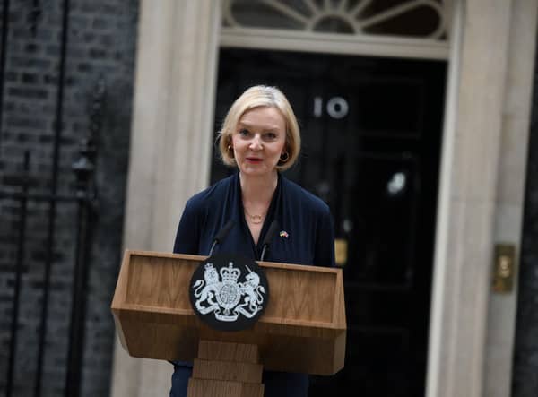 Britain's Prime Minister Liz Truss delivers a speech outside of 10 Downing Street in central London on October 20, 2022 to announce her resignation. - British Prime Minister Liz Truss announced her resignation on after just six weeks in office that looked like a descent into hell, triggering a new internal election within the Conservative Party. (Photo by Daniel LEAL / AFP) (Photo by DANIEL LEAL/AFP via Getty Images)