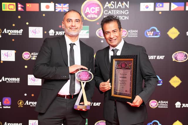 Paprika Club owners Shamim Uddim and Mohammed Azad receive the Asian Restaurant of The Year West Midlands award at the Asian Curry Awards ceremony 2023. Picture supplied.