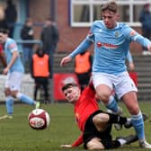 Rugby Town midfielder Caine Elliott in action during Saturday's defeat to Sportking Khalsa (Picture: Martin Pulley)