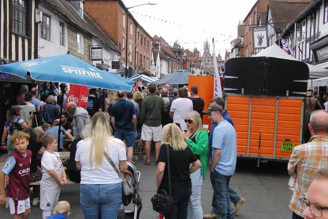 The event saw many shops, restaurants and businesses coming onto the street to join the celebrations, alongside entertainers, craft stalls, street food and live music. Photo by Geoff Ousbey