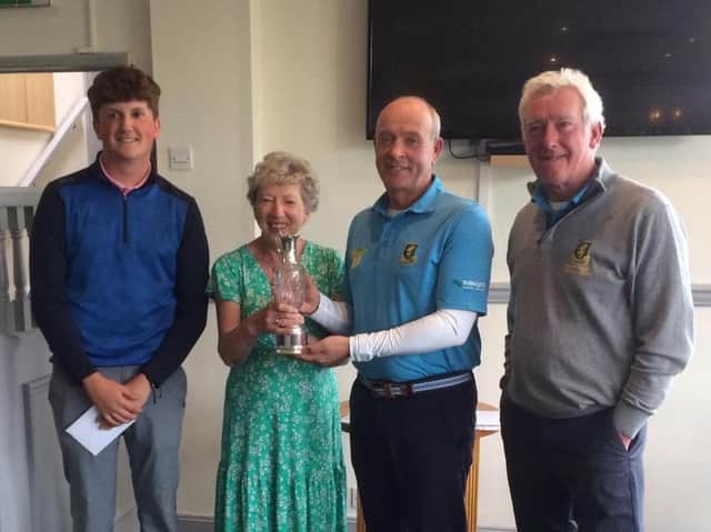 Harry Ridley, Joy Clark (who presented the trophy), Martin Weaver and Club Captain Steve Hamp