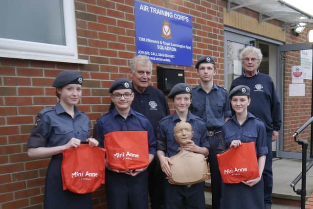 Lions members Neil Chisholm and John Tunney with members of No. 1368 Warwick & Leamington Spa Squadron Air Cadets at their Stratford Road training centre. Photo supplied