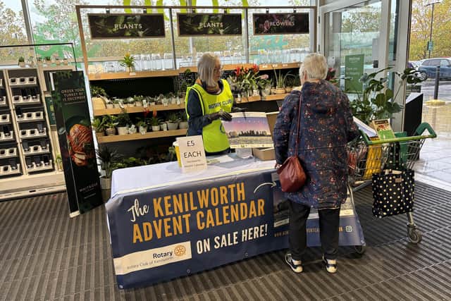Jenny Wilkinson, Lib Dem parliamentary candidate for Kenilworth and Southam, serving a customer for the Advent Calendar in Waitrose.
