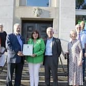 The Friends of the Hospital of St Cross receive a Special Appreciation Award from the Mayor of Rugby - (left to right) Christine Nobes, Marie Guyett, Sue Phelan, Willy Goldschmidt, Cllr Maggie O'Rourke, Doug Jones, Jan Jones, Bob Tooze and Ramesh Srivastava.