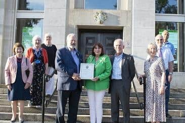 The Friends of the Hospital of St Cross receive a Special Appreciation Award from the Mayor of Rugby - (left to right) Christine Nobes, Marie Guyett, Sue Phelan, Willy Goldschmidt, Cllr Maggie O'Rourke, Doug Jones, Jan Jones, Bob Tooze and Ramesh Srivastava.