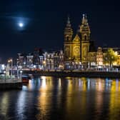From centuries-old Dutch Baroque canal houses to Gothic Revival, the city’s filled with astounding buildings. Here's a view of Saint Nicholas Church at night. Picture: AURORE BELOT.