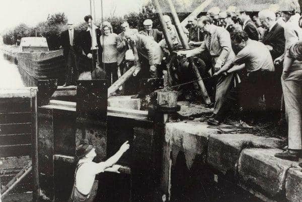 Lock gate being lowered at Engine Lock to mark the start of the restoration of the Caldon Canal. 1973. Credit: Canal & River Trust.