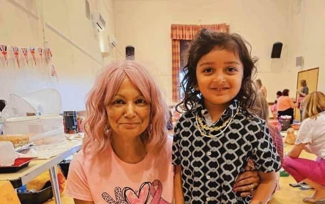 June Lee and a young fundraiser at one of her other charity events.