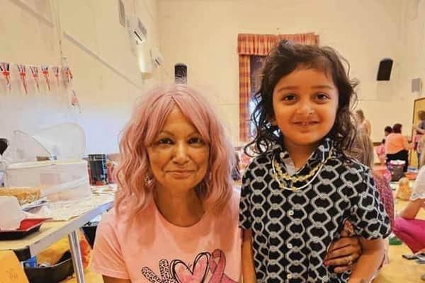 June Lee and a young fundraiser at one of her other charity events.