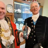 Mayor of Nuneaton Cllr Jeff Clarke with his gift from High Sheriff David Kelham.