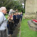 Telford Junior School pupils learning about war memorial at the church. Photo supplied
