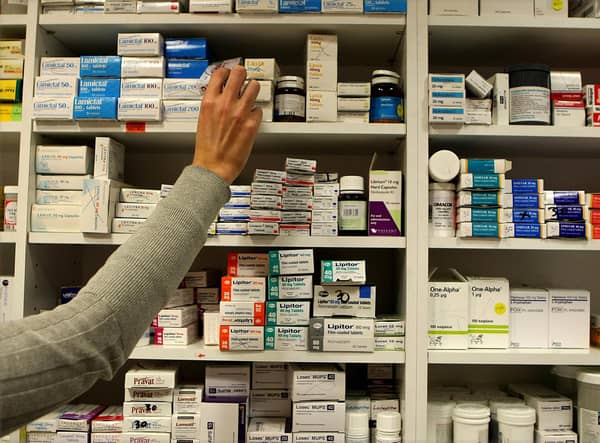 File photo dated 16/11/09 of a pharmacist stocking shelves at a chemist. Pharmacies could ease pressure on the NHS, according to an industry leader. As he prepared to enter into emergency talks with the Prime Minister on Saturday, executive director of Day Lewis pharmacy group Jay Patel said pharmacies could test and treat infections and play a more leading role in prescribing medications. Issue date: Saturday January 7, 2023.