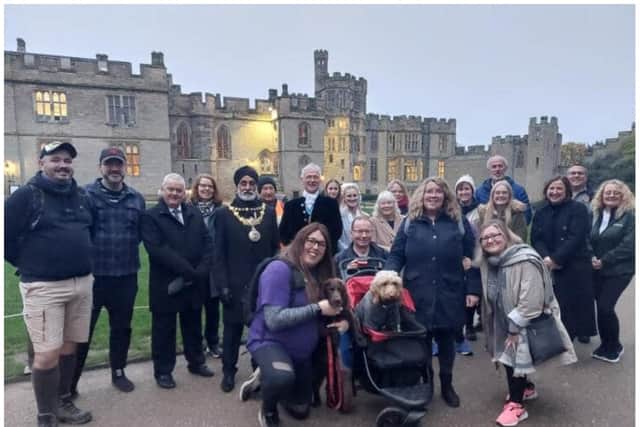 The walking team with their welcoming party at Warwick Castle. Photo supplied