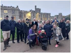 The walking team with their welcoming party at Warwick Castle. Photo supplied
