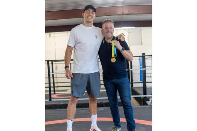 David Blick with Commonwealth Games gold medallist Lewis Williams at Cleary's Boxing Gym. Photo supplied