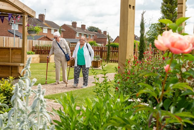 Two Cubbingtonians stroll though the new sensory garden at the Recreation Ground.