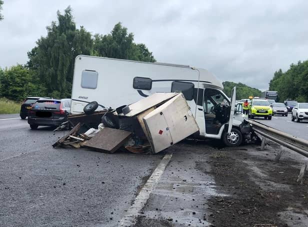 A motorhome lost control in the wet and collided with the central barrier on the M40 near junction 15.