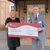 Louise Careless, community fundraiser at The Myton Hospices with Warwick Rotary President Keith Talbot. Photo supplied