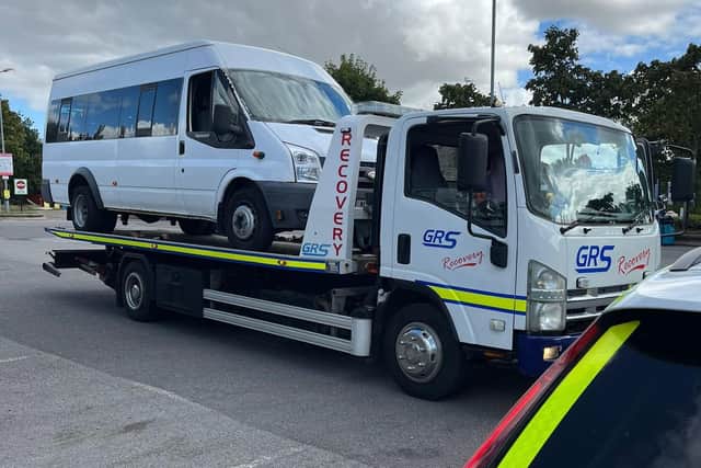 The Ford Transit minibus was cloned on false number plates to hide document offences and was stopped on the M40 Warwick Services southbound.