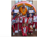 Members of the Warwick Lions Club visited St Mark’s Church in Leamington to present the Lions Young Leader in Service awards to 15-year-old Emmeline Lamb and 16-year-old Eva Brown who both completed more than 100 hours community service with the St Mark’s Rainbow Guides group. Photo supplied