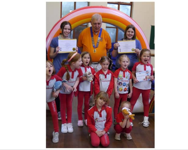 Members of the Warwick Lions Club visited St Mark’s Church in Leamington to present the Lions Young Leader in Service awards to 15-year-old Emmeline Lamb and 16-year-old Eva Brown who both completed more than 100 hours community service with the St Mark’s Rainbow Guides group. Photo supplied