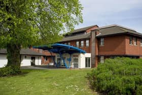 The chair of the NHS Trust that runs Hospital of St Cross, Rugby, insists plans are in place for “considerable investment” in “more services”.