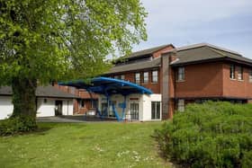 The chair of the NHS Trust that runs Hospital of St Cross, Rugby, insists plans are in place for “considerable investment” in “more services”.
