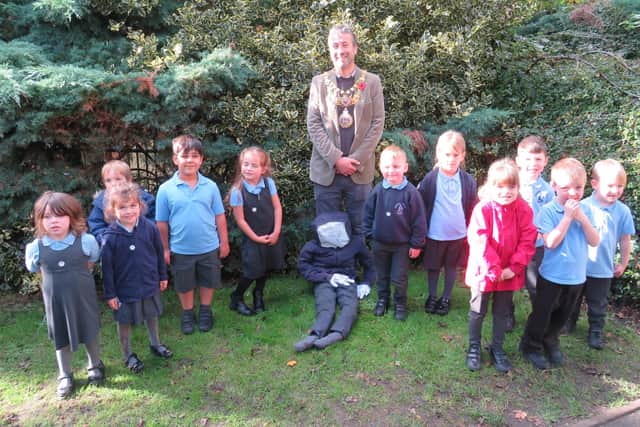 The Mayor of Warwick, Cllr Oliver Jacques with Westgate Primary School pupils and their guy. Photo supplied