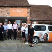 Owners, Phil and Phil with some of the Unique Senior Care team