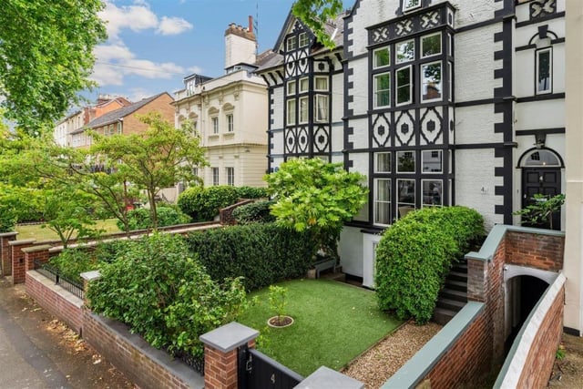 The property stands out with its black and white facade. Photo by Fine and Country