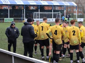 Warwick take a breather from the mudbath pitch at Lye Town.