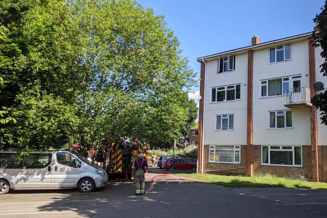 The damage to the flat (in the top left of the building) could be seen from the road outside.