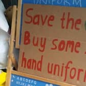 A sign for the uniform recycling shop at St Paul's School. Picture supplied.